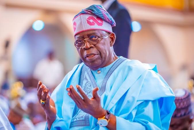 President Bola Tinubu at a public event amid renewed political discussions